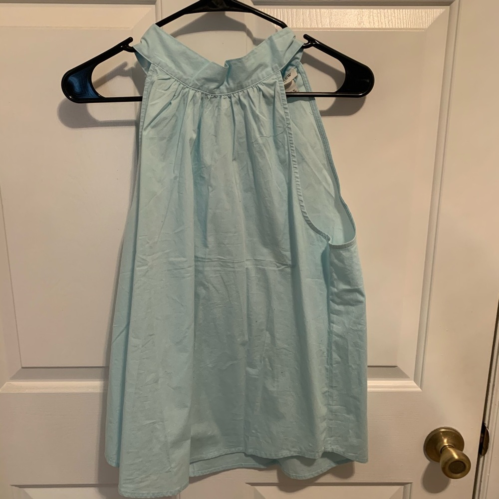 Light green sleeveless top